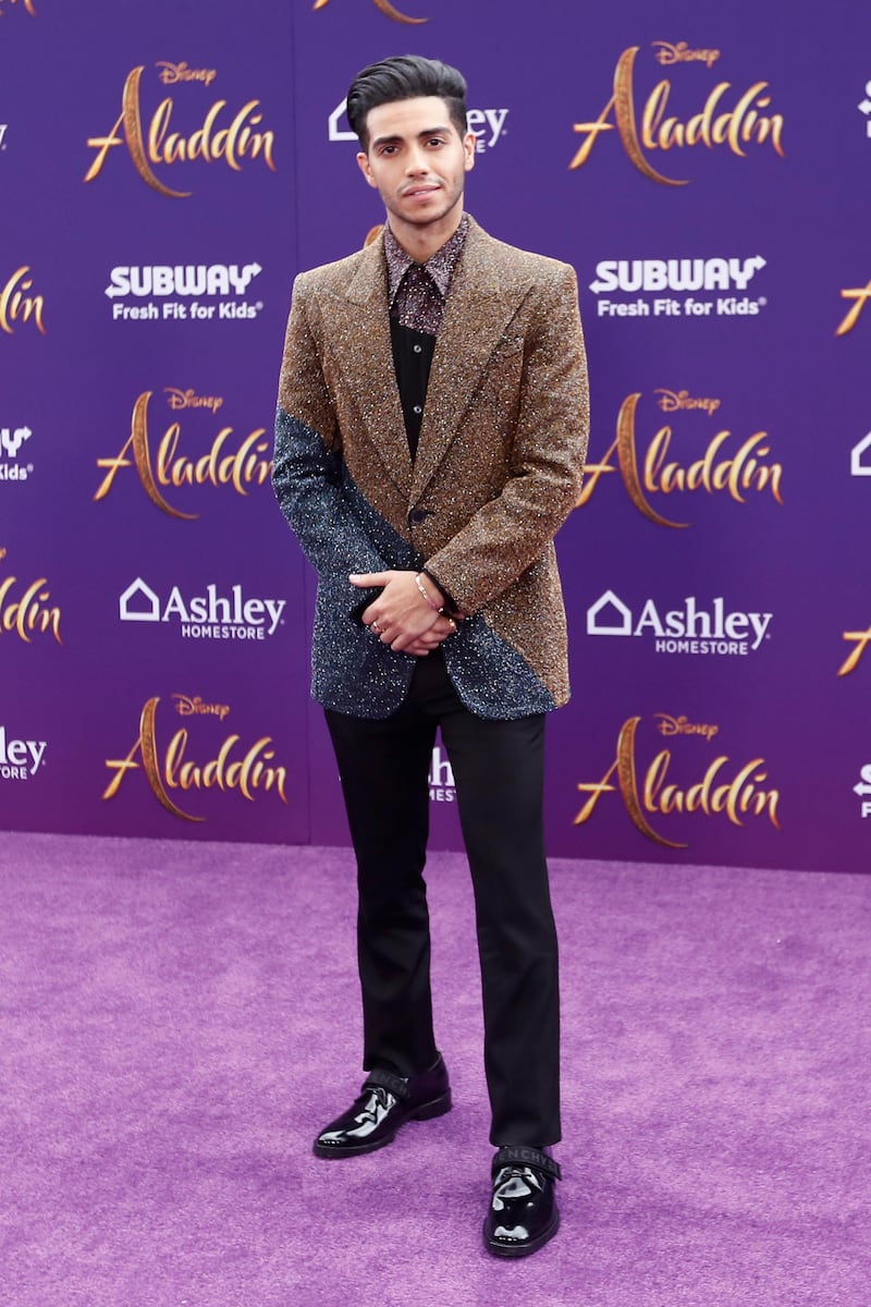 epa07590751 Canadian actor Mena Massoud poses on the red carpet during Disney's 'Aladdin' movie premiere at the El Capitan Theatre in Hollywood, California, USA, 21 May 2019. The movie opens in US theaters on 24 May 2019.  EPA-EFE/ETIENNE LAURENT