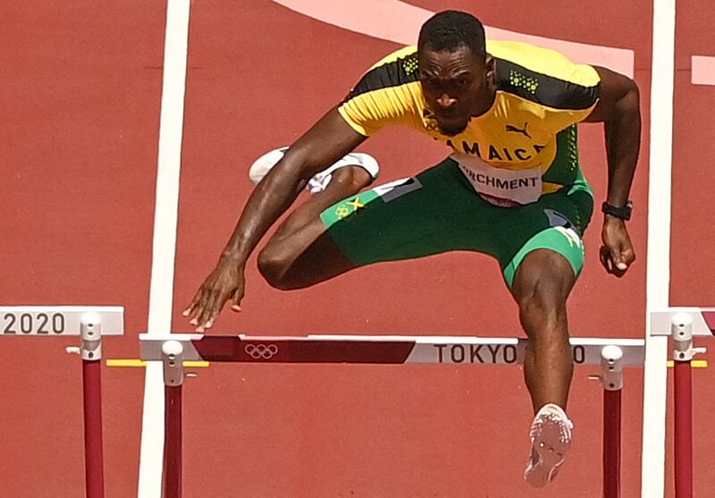 Jamaica's Hansle Parchment competes in the men's 110m hurdles final.