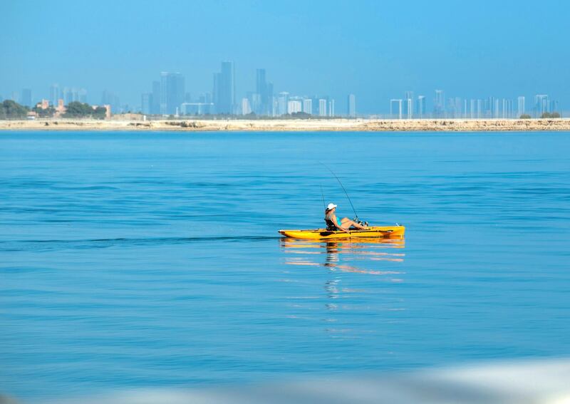 Abu Dhabi, UAE, April 30, 2021. Recreational watercraft is a common sight on weekends along the Al Raha Creek, Aldar Headquarters area.. Victor Besa / The National.