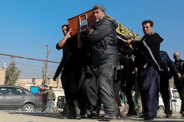 People carry the coffin of an Afghan female judge gunned down in Kabul. EPA