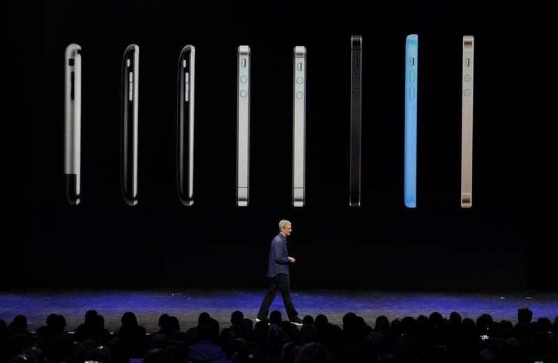 Tim Cook, chief executive officer of Apple Inc., speaks during a product announcement at Flint Center in Cupertino, California. David Paul Morris / Bloomberg