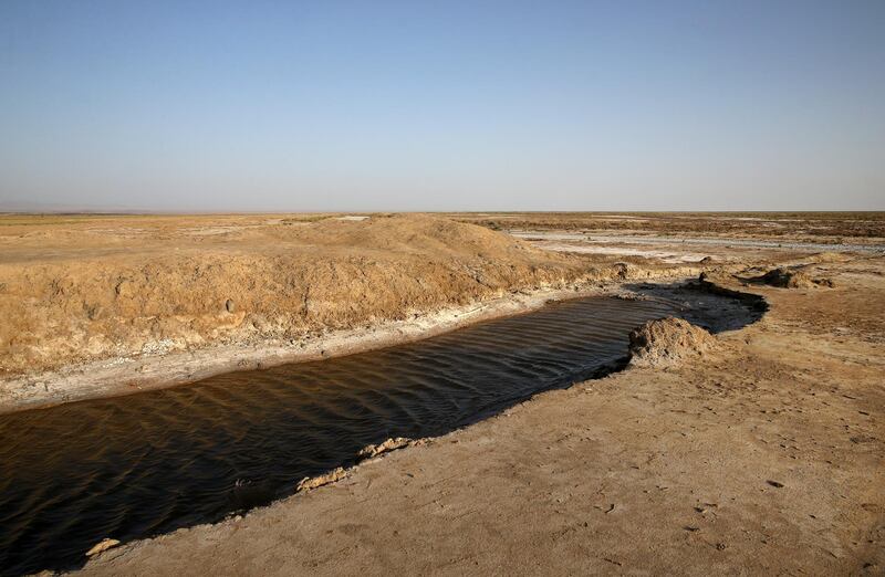 One of last puddles of salty water remaining in the Gavkhouni wetlands, on July 10, 2018. AP Photo