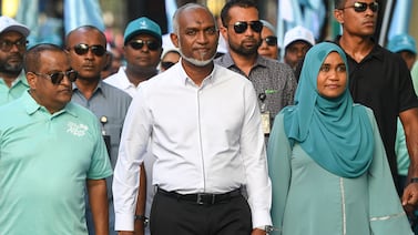 Maldives President Mohamed Muizzu and his supporters take part in a campaign rally in the capital, Malé, on the eve of Sunday's parliamentary election. AFP