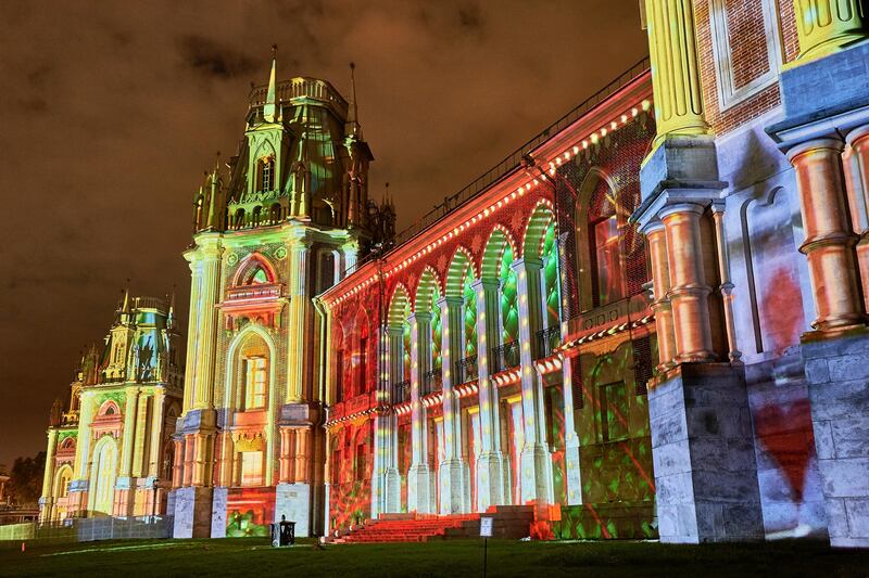 Spectators watch a light show at The Grand Palace in Tsaritsyno, during the VII Moscow International Festival Circle of Light. Dmitry Abaza / AP Photo