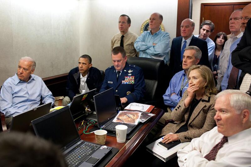 Former US president Barack Obama, secretary of state Hillary Clinton and members of the national security team receive updates on the mission against Osama bin Laden in May 2011 AFP Photo / White House 