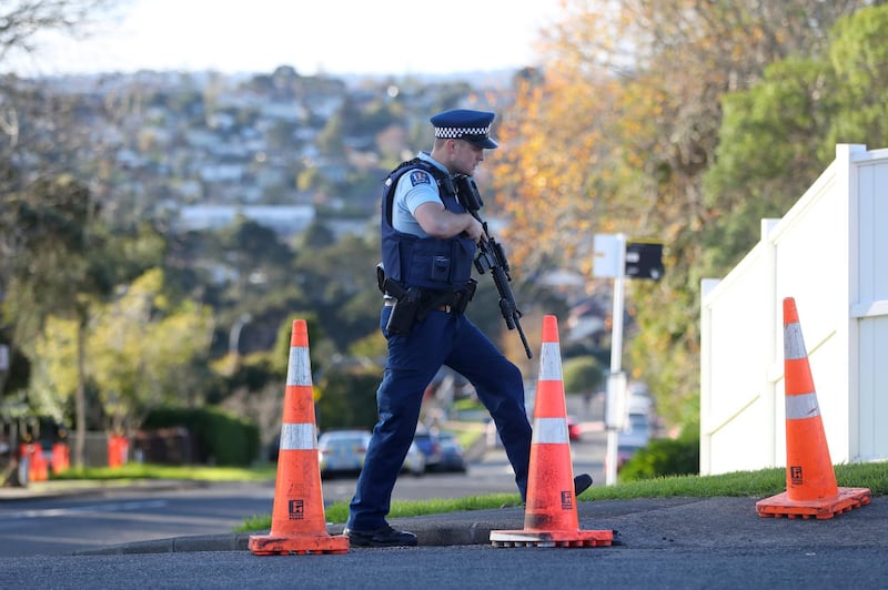 New Zealand Police guard Reynella Drive in Auckland, New Zealand. Getty Images