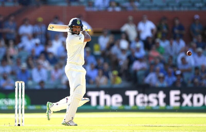 epa07211662 Indian batsman Cheteshwar Pujara looks on after playing a shot on day one of the first Test match between Australia and India at the Adelaide Oval in Adelaide, Australia, 06 December 2018.  EPA/DAVE HUNT NO ARCHIVING, EDITORIAL USE ONLY, IMAGES TO BE USED FOR NEWS REPORTING PURPOSES ONLY, NO COMMERCIAL USE WHATSOEVER, NO USE IN BOOKS WITHOUT PRIOR WRITTEN CONSENT FROM AAP AUSTRALIA AND NEW ZEALAND OUT