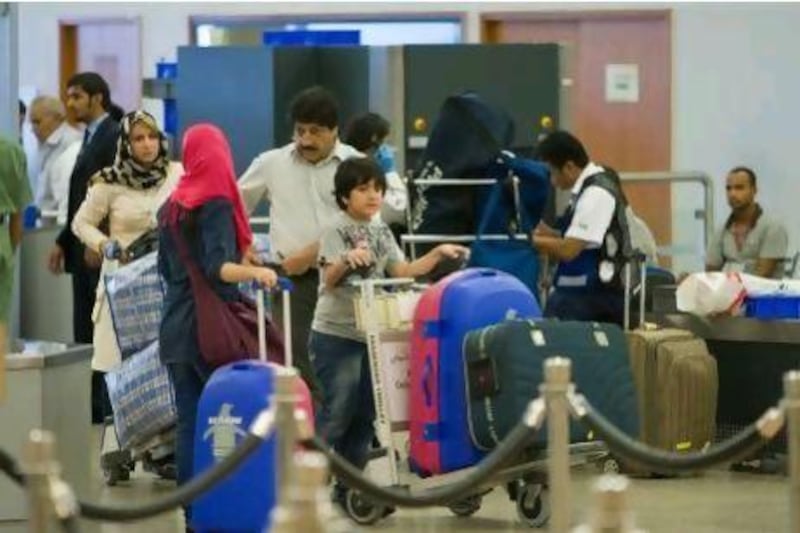 Abu Dhabi hopes to boost tourism by luring transit passengers out of the waiting lounges and into the city. Amy Leang / The National