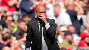 Manchester City's head coach Pep Guardiola gestures during the English FA Cup final soccer match between Manchester City and Manchester United at Wembley Stadium in London, Saturday, May 25, 2024.  (AP Photo / Kin Cheung)