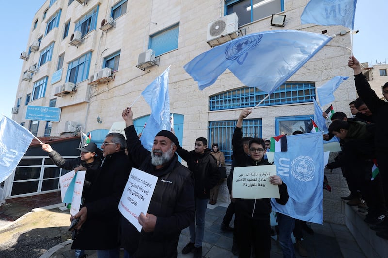 Palestinians protest against frozen funding during a rally held outside the main UNRWA offices in Ramallah in the occupied West Bank. AFP