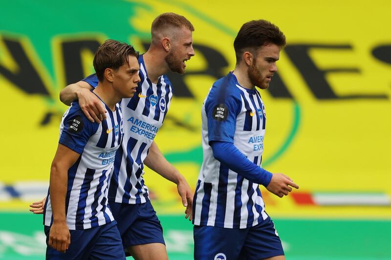 epa08526350 Leandro Trossard (L) of Brighton celebrates with teammates after scoring the opening goal during the English Premier League match between Norwich City and Brighton & Hove Albion in Norwich, Britain, 04 Juy 2020.  EPA/Richard Heathcote/NMC/Pool EDITORIAL USE ONLY. No use with unauthorized audio, video, data, fixture lists, club/league logos or 'live' services. Online in-match use limited to 120 images, no video emulation. No use in betting, games or single club/league/player publications.