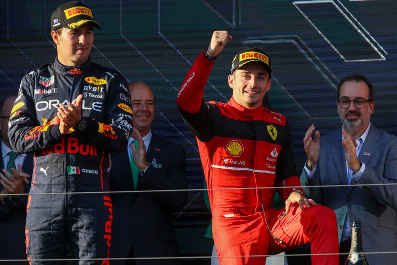 Ferrari driver Charles Leclerc celebrates on the podium after winning the Australian Formula One Grand Prix in Melbourne, Australia, Sunday, April 10, 2022. AP