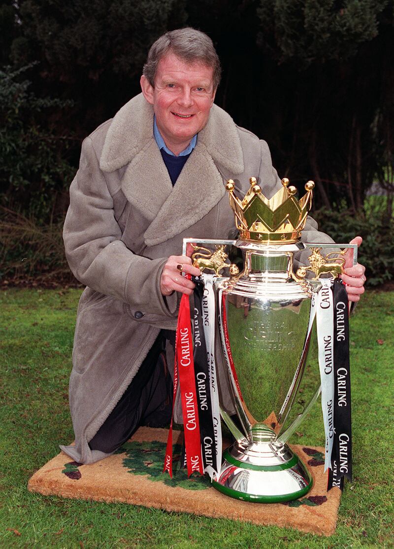 With the English Premier League trophy in 1998. PA