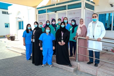 Abu Dhabi, United Arab Emirates, October 4, 2020.  Dr. Mouza Al Ameri, (2nd from right) Head of  the  Tawam Breast Cancer Centre with her team.  Victor Besa/The National
Section:  NA
Reporter:  Haneen Dajani
