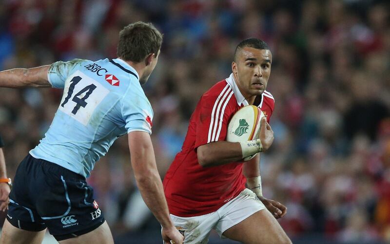 SYDNEY, AUSTRALIA - JUNE 15:  Simon Zebo of the Lions moves past Cam Crawford during the match between the NSW Waratahs and the British & Irish Lions at Allianz Stadium on June 15, 2013 in Sydney, Australia.  (Photo by David Rogers/Getty Images) *** Local Caption ***  170603524.jpg