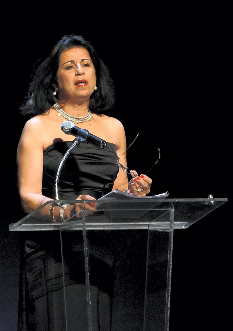 Egyptian author Ahdaf Soueif reads texts at the opening of the Kennedy Center Arab Festival Arabesque in Washington on February 23, 2009. Some 800 artists will perform during the festival which runs until March 15.      AFP PHOTO/Nicholas KAMM (Photo by NICHOLAS KAMM / AFP)