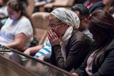 ABU DHABI, UNITED ARAB EMIRATES. 09 DECEMBER 2017. Prayer for UAE at the Abu Dhabi National Theater. People bow their heads in prayer. (Photo: Antonie Robertson/The National) Journalist: Shereena Al Nuwais. Section: National.