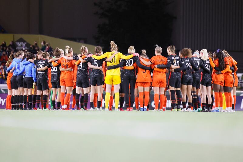 Portland Thorns and Houston Dash players stand together at the six-minute mark during the first half of a NWSL soccer match at Providence Park, Portland, Oregon, USA. Reuters