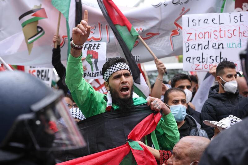 Banners supporting the Palestinian cause are paraded by demonstrators in Berlin, Germany. Getty Images