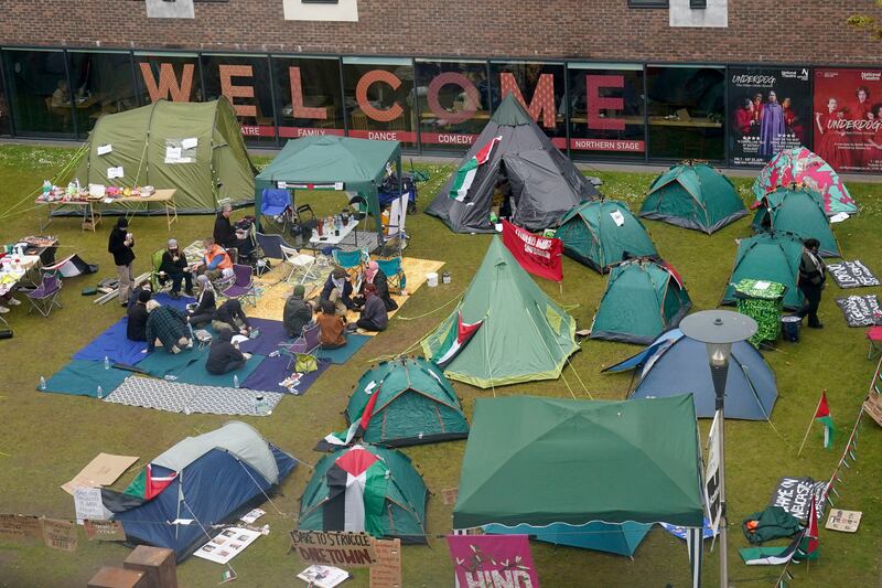 Tents are set up at a camp on the grounds of Newcastle University in England. AP