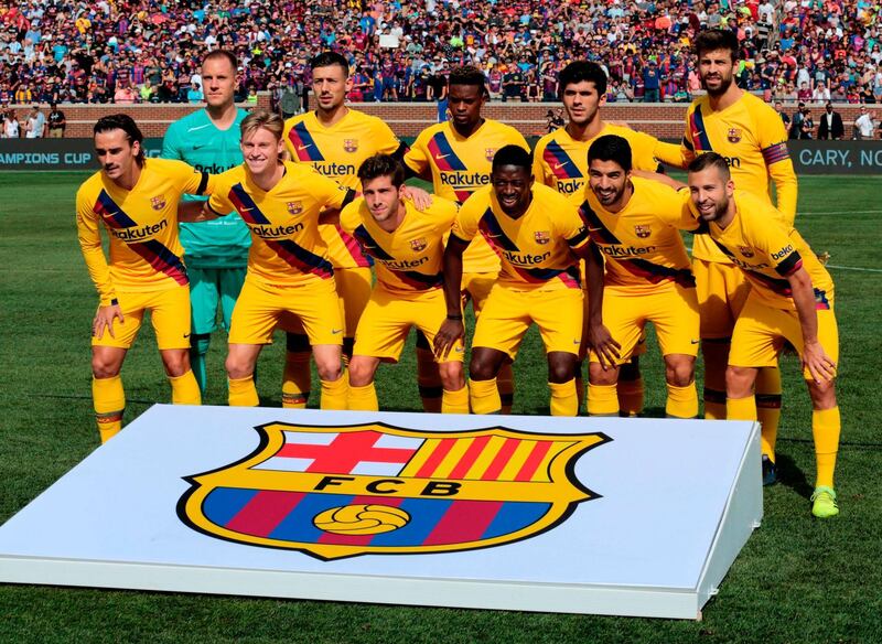 Barcelona's players pose before the game. AFP