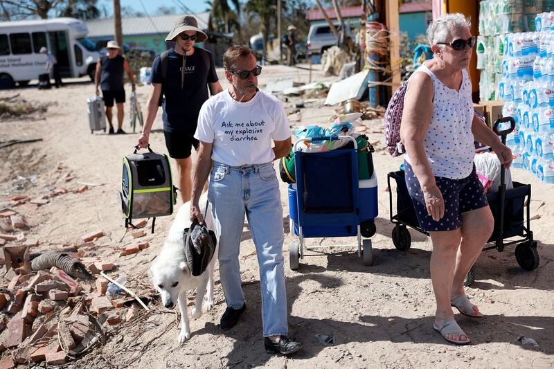 Many island residents were waiting to be moved to safety with their pets. Getty / AFP