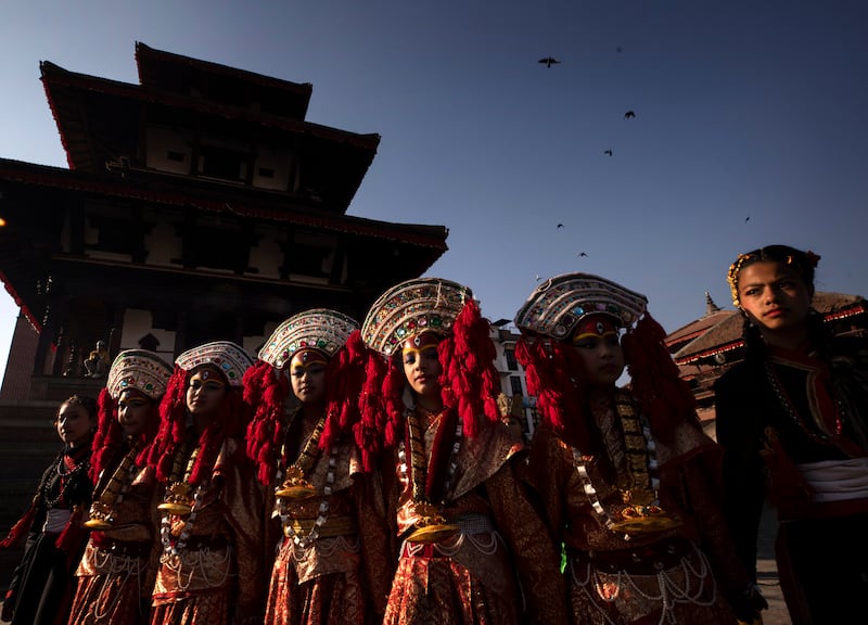Children in traditional attire take part in a procession marking Jyapu Day celebrations in Kathmandu, Nepal. EPA