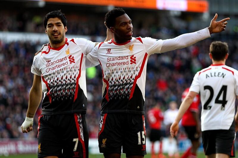 Daniel Sturridge, right, has 26 goals in 20 Premier League matches for Liverpool this season. Luis Suarez, left, has 30 in 30. Ben Hoskins / Getty Images