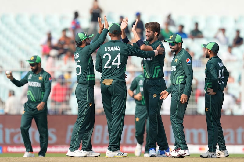 Pakistan's Shaheen Afridi, third right, celebrates the wicket of Bangladesh's Tanzid Hasan with teammates during the ICC Men's Cricket World Cup match between Bangladesh and Pakistan in Kolkata, India. AP Photo