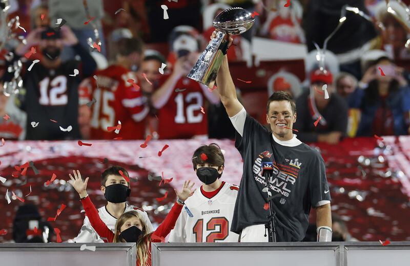 Quarterback Tom Brady celebrates with the Vince Lombardi Trophy after the Tampa Bay Buccaneers defeated the Kansas City Chiefs to win Super Bowl LV. EPA