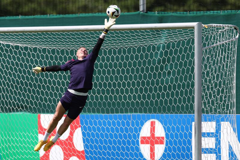 England goalkeeper Jordan Pickford makes a save. AFP
