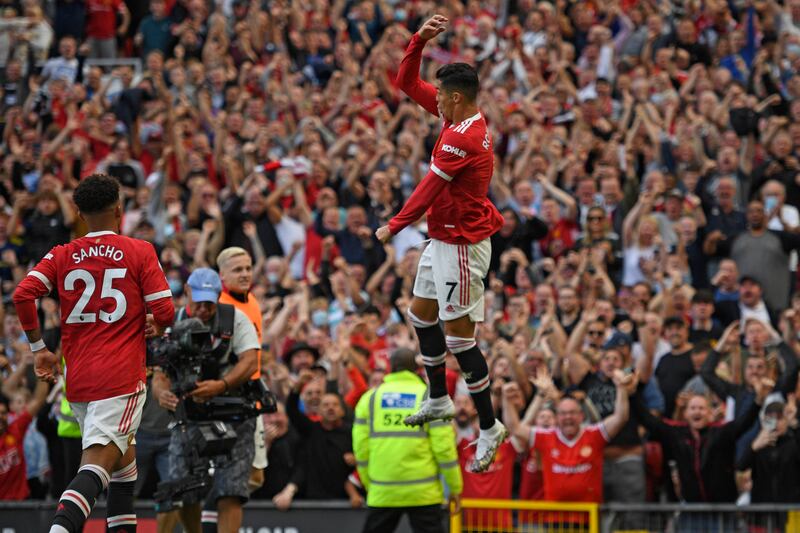 Manchester United's Cristiano Ronaldo celebrates after scoring against Newcastle United at Old Trafford on September 11, 2021. AFP