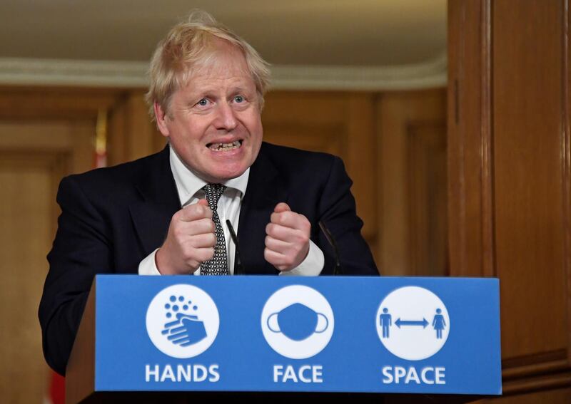 Britain's Prime Minister Boris Johnson gestures as he speaks during a press conference where he is expected to announce new restrictions to help combat the coronavirus disease (COVID-19) outbreak, at 10 Downing Street in London, Britain October 31, 2020. Alberto Pezzali/Pool via REUTERS