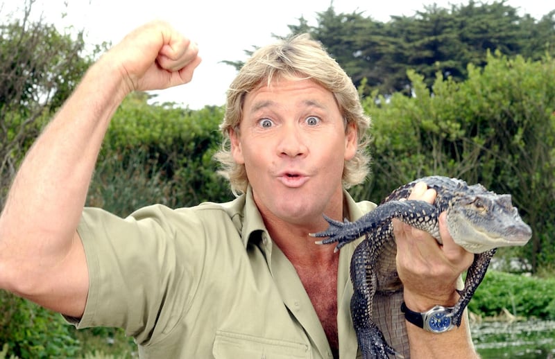 SAN FRANCISCO - JUNE 26:  ***EXCLUSIVE*** "The Crocodile Hunter", Steve Irwin, poses with a three foot long alligator at the San Francisco Zoo on June 26, 2002 in San Francisco, California. Irwin is on a 3-week tour to promote the release of his first feature film, "The Crocodile Hunter: Collision Course", due in theaters July 12th.  (Photo by Justin Sullivan/Getty Images)