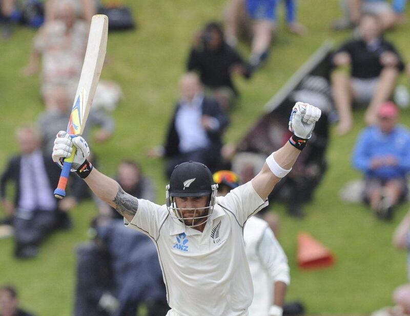 New Zealand’s Brendon McCullum celebrates his triple century against India on the final day of the second Test v India. Ross Setford/ SNPA / AP  