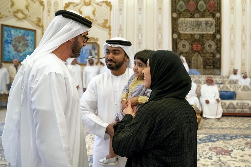 ABU DHABI, UNITED ARAB EMIRATES - October 21, 2019: HH Sheikh Mohamed bin Zayed Al Nahyan, Crown Prince of Abu Dhabi and Deputy Supreme Commander of the UAE Armed Forces (L), stands for a photograph with family members who received "Amntk Bladk" token, during a Sea Palace barza.

( Hamad Al Kaabi / Ministry of Presidential Affairs )​
---