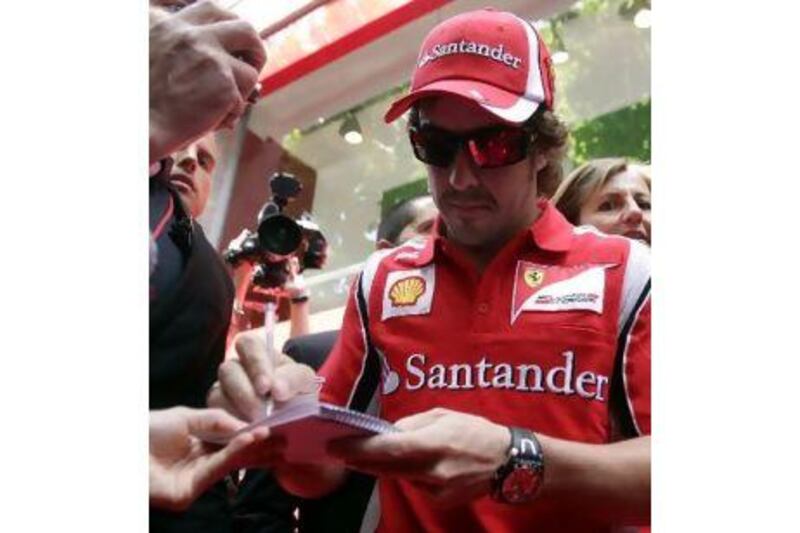Fernando Alonso has signed a new contract with Ferrari. Albert Gea / Reuters
