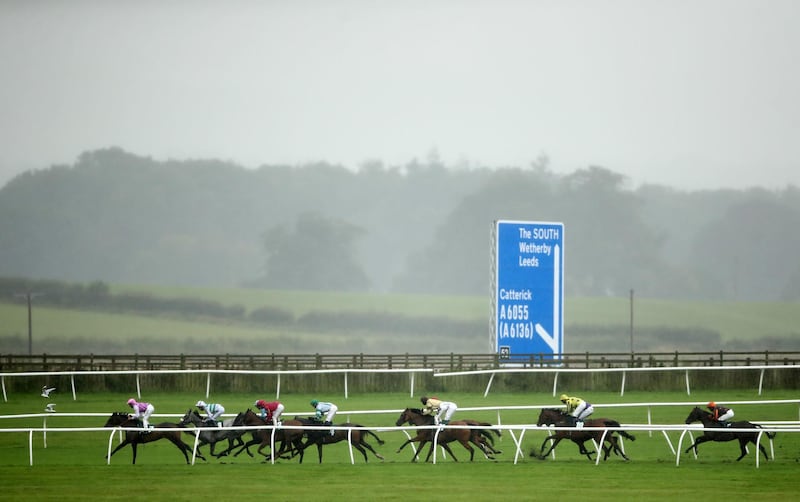 Runners and riders in the Brokes Fillies' Handicap at Catterick Bridge Racecourse in Enland onTuesday August 25. PA