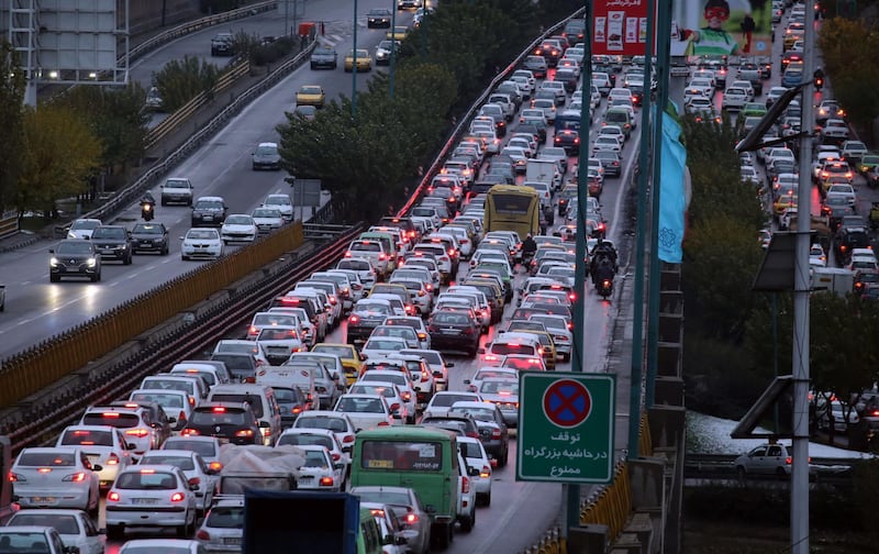 Protesters block a highway in Tehran after the petrol price increase.  EPA