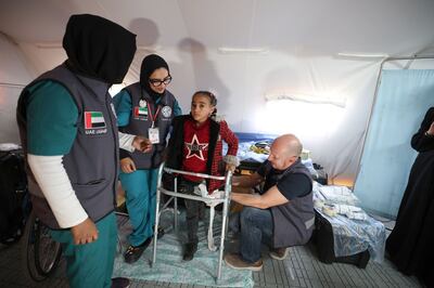 Healthcare workers with a young patient at the new centre. Photo: Wam

