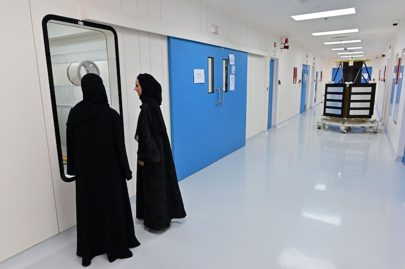 Engineers walk the corridors of Mohammed Bin Rashid Space Centre. AFP
