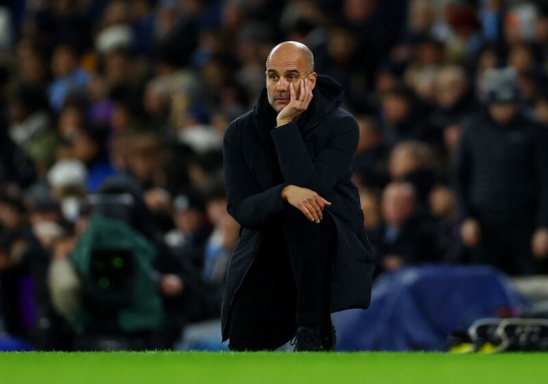 Manchester City manager Pep Guardiola looks dejected in the first half. Reuters