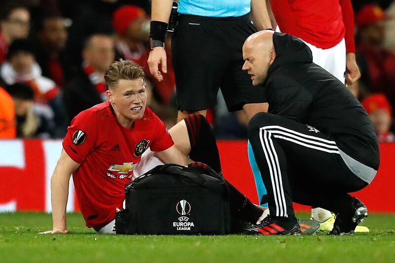 Manchester United's Scott McTominay receives treatment. PA