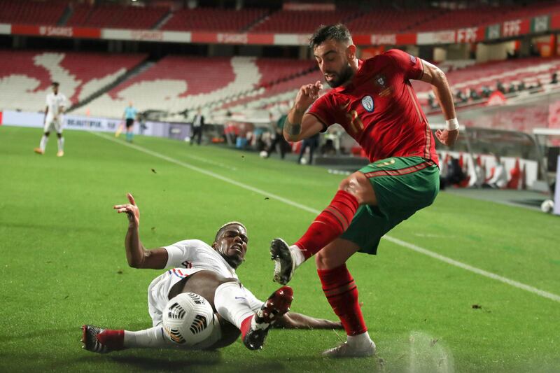 Portugal's Bruno Fernandes in action against France's Paul Pogba during their UEFA Nations League Group 3 match held at Luz Stadium, in Lisbon, Portugal, 14 November 2020. EPA