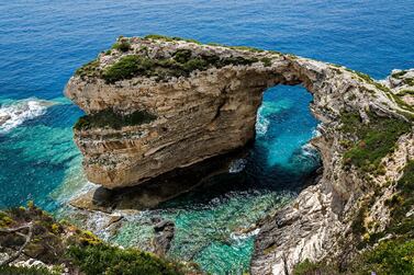  Paxos offers a quiet escape and turquoise waters. Alamy