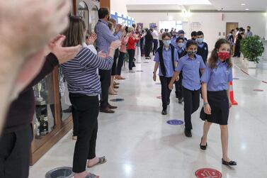 Abu Dhabi, United Arab Emirates, February 16, 2021. Teachers of the British School Al Khubairat welcome the level 7 students back to school. Victor Besa/The National Reporter: Haneen Dajani Section: NA