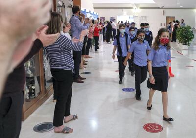 Abu Dhabi, United Arab Emirates, February 16, 2021.  Teachers of the British School Al Khubairat welcome the level 7 students back to school.
Victor Besa/The National
Reporter:  Haneen Dajani
Section:  NA