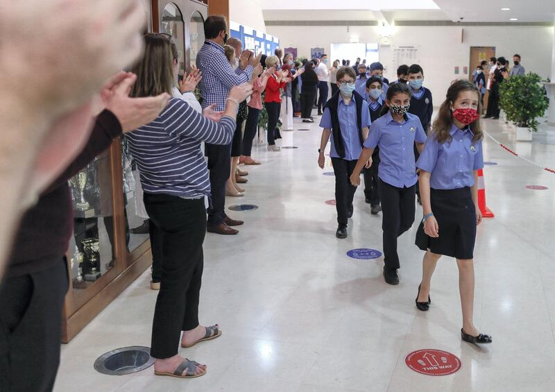 Abu Dhabi, United Arab Emirates, February 16, 2021.  Teachers of the British School Al Khubairat welcome the level 7 students back to school.
Victor Besa/The National
Reporter:  Haneen Dajani
Section:  NA