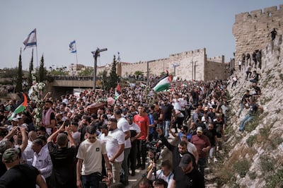 Mourners carry the coffin of slain Al Jazeera veteran journalist Shireen Abu Akleh during her funeral in Jerusalem. AP