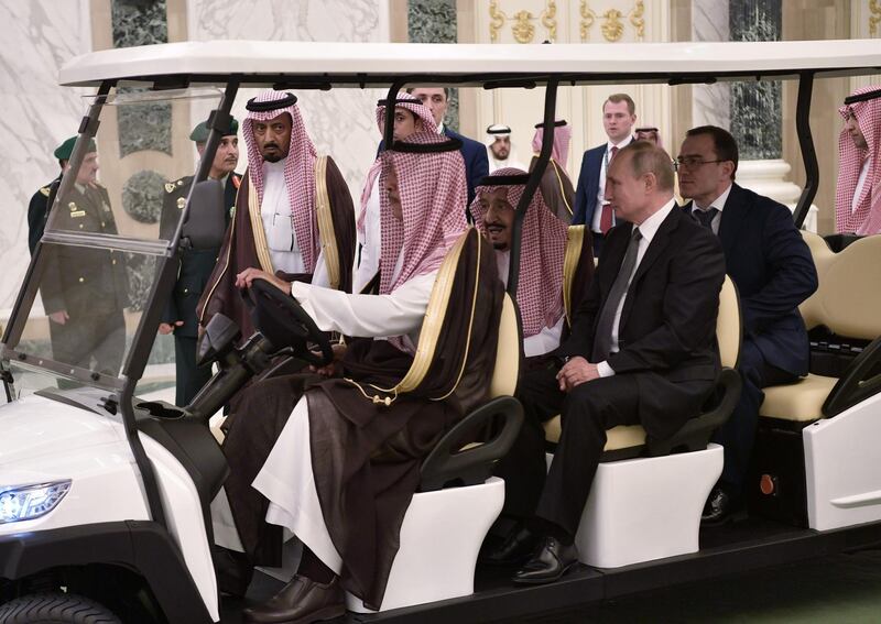 Mr Putin and King Salman meet in Riyadh. EPA